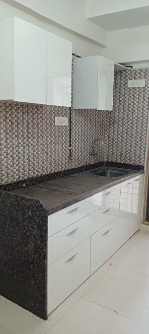 Kitchen in 3 BHK Apartment at New India Grace Luxuria, Malad West – for Rent