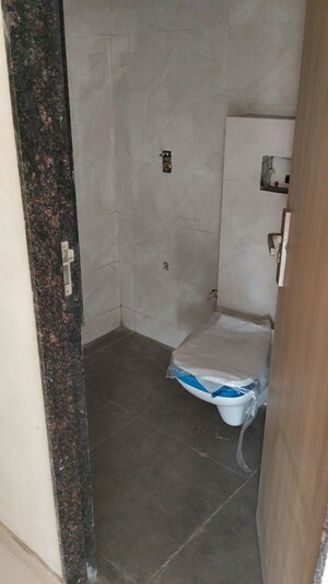 Bathroom in 2 BHK Apartment at Newlook Bhavya Elite, Wadala – for Sale