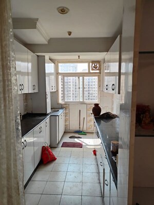 Kitchen in 3 BHK Apartment at Amrapali Golf Homes, Sector 4 Greater Noida – for Sale