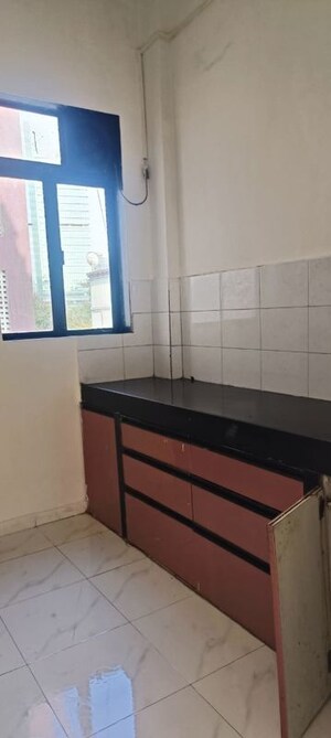 Kitchen in 1 BHK Apartment at Mahavir Sargam CHS, Ghansoli – for Rent