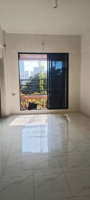 Living Room in 1 BHK Apartment at Mahavir Sargam CHS, Ghansoli – for Rent