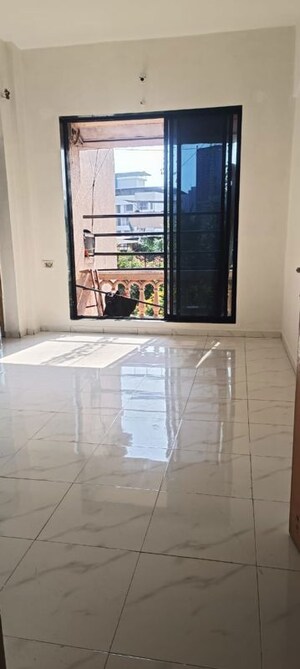 Bedroom in 1 BHK Apartment at Mahavir Sargam CHS, Ghansoli – for Rent