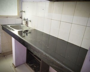 Kitchen in 1 RK Apartment at Ansal Sushant Estate, Sector 52 – for Sale