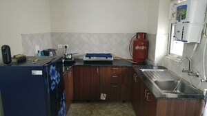 Kitchen in 2 BHK Apartment at Amrapali Centurian Park, Tech Zone 4 Greater Noida – for Sale