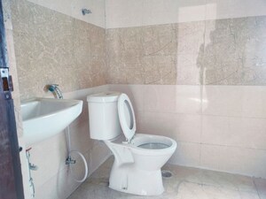Bathroom in 2.5 BHK Apartment at Amrapali Golf Homes, Sector 4 Greater Noida – for Sale