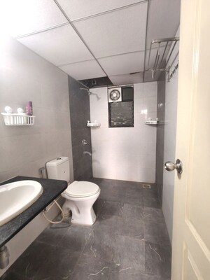 Bathroom in 2 BHK Apartment at Kolte Patil Margosa Heights, Mohammadwadi – for Rent
