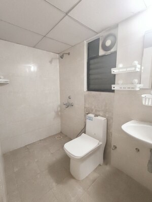 Bathroom in 2 BHK Apartment at Kolte Patil Margosa Heights, Mohammadwadi – for Rent