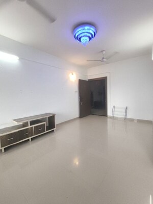 Living Room in 2 BHK Apartment at Kolte Patil Margosa Heights, Mohammadwadi – for Rent