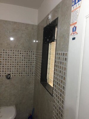 Bathroom in 2 BHK Apartment at Shree Tirupati Maple Tower, Kondhwa – for Rent