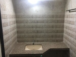 Bathroom in 2 BHK Apartment at Shree Tirupati Maple Tower, Kondhwa – for Rent