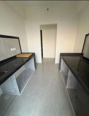 Kitchen in 2 BHK Apartment at Mahavir Square, Manpada – for Rent