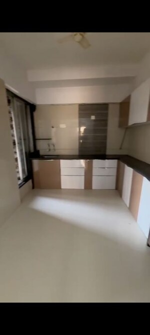 Kitchen in 3 BHK Apartment at Unique Poonam Estate Cluster 2, Mira Road – for Rent