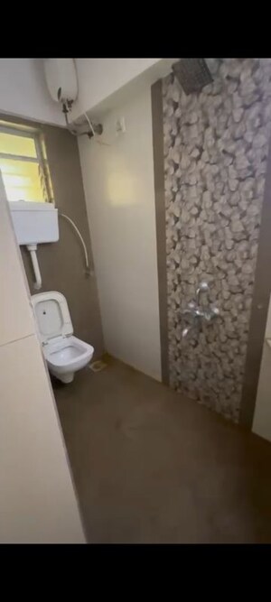 Bathroom in 3 BHK Apartment at Unique Poonam Estate Cluster 2, Mira Road – for Rent