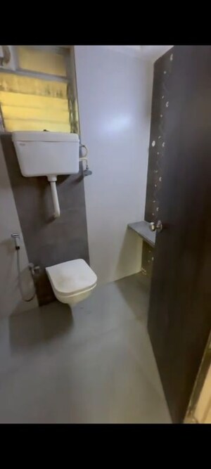 Bathroom in 3 BHK Apartment at Unique Poonam Estate Cluster 2, Mira Road – for Rent