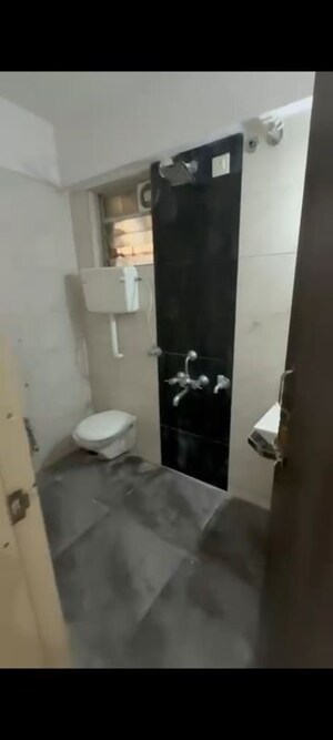 Bathroom in 3 BHK Apartment at Unique Poonam Estate Cluster 2, Mira Road – for Rent