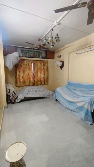 Living Room in 2 BHK Apartment at Somwar Peth – for Sale