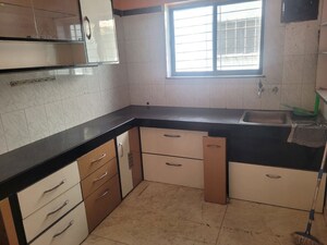 Kitchen in 3 BHK Apartment at Model Colony – for Sale