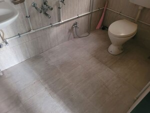 Bathroom in 3 BHK Apartment at Model Colony – for Sale