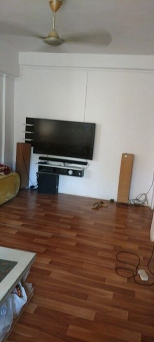 Living Room in 1 BHK Apartment at Juhu – for Rent