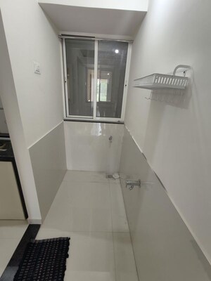 Staircase in 2 BHK Apartment at Megapolis Serenity, Hinjewadi – for Rent