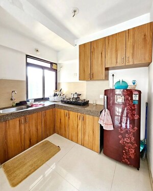 Kitchen in 1 BHK Apartment at Kanakia Rainforest, Andheri East – for Rent