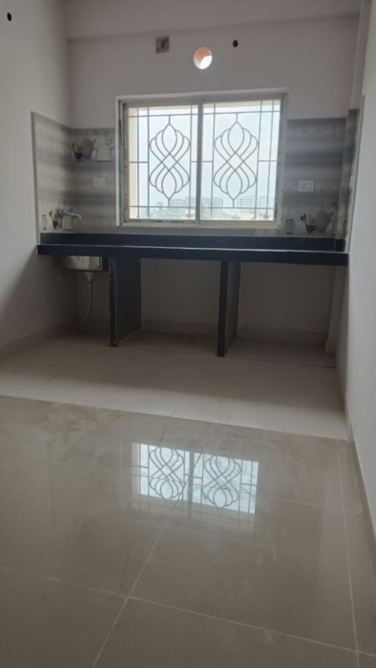 Kitchen, rekjuani 2 Bedroom 754 Sq.Ft. Apartment In Rekjuani Kolkata 10210629