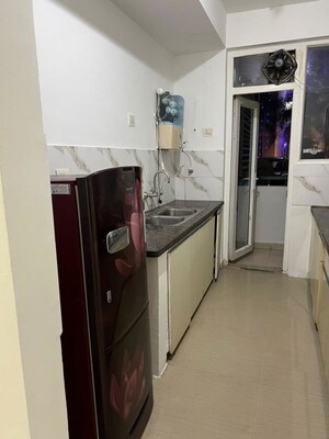 Kitchen in 2 BHK Apartment at NK Sharma Savitry Greens, Lohgarh – for Rent