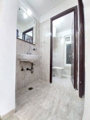 Bathroom in 1 BHK Apartment at Rishabh Cloud Habitate9 Towers, Vaishali Sector 9 – for Rent