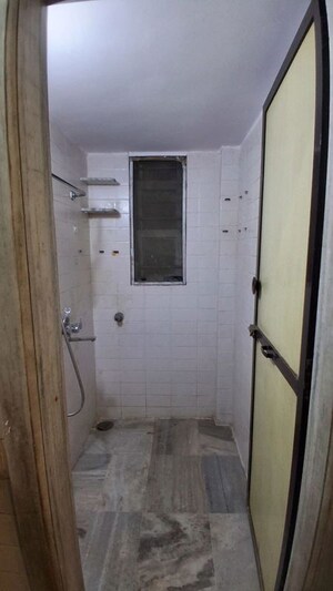 Bathroom in 1 BHK Apartment at Raheja Township, Malad East – for Rent