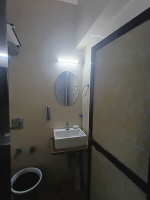 Bathroom in 2 BHK Apartment at Raunak Charnamrut CHS, Ghodbunder Road – for Rent