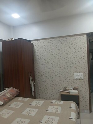 Living Room in 2 BHK Apartment at Raunak Charnamrut CHS, Ghodbunder Road – for Rent