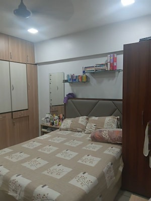 Bedroom in 2 BHK Apartment at Raunak Charnamrut CHS, Ghodbunder Road – for Rent