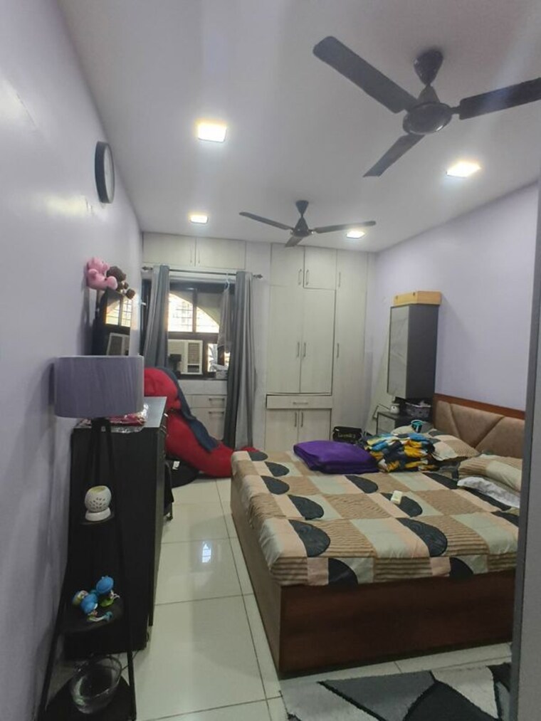 Master Bedroom, raunak-charnamrut-chs 2 Bedroom 550 Sq.Ft. Apartment In Ghodbunder Road Thane 10210987