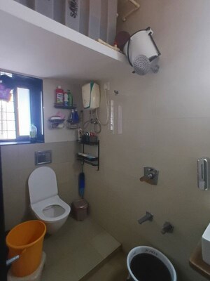 Bathroom in 2 BHK Apartment at Raunak Charnamrut CHS, Ghodbunder Road – for Rent