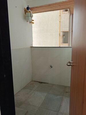 Bathroom in 3 BHK Apartment at Godrej Garden City, Jagatpur – for Rent