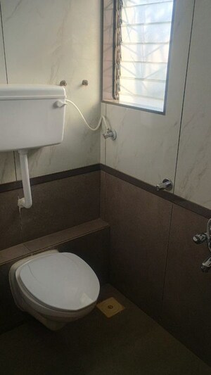 Bathroom in 1 BHK Apartment at Crowngold Kalpatru Avenue, Naigaon East – for Sale