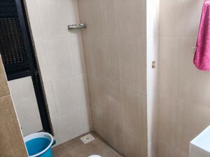 Bathroom in 1 BHK Apartment at Kanakia Rainforest, Andheri East – for Rent