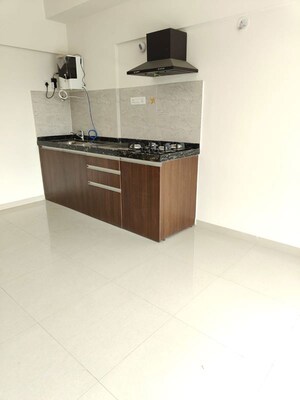 Kitchen in Studio Apartment at Gera World of Joy, Kharadi – for Rent