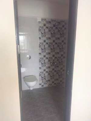 Bathroom in 2 BHK Apartment at Vedant Kingston Aura, Handewadi – for Rent