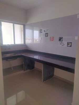 Kitchen in 2 BHK Apartment at Vedant Kingston Aura, Handewadi – for Rent