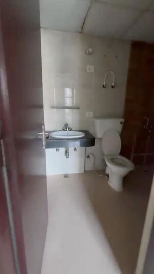 Bathroom in 2 BHK Apartment at Nimbus The Express Park View II, Chi V Greater Noida – for Sale