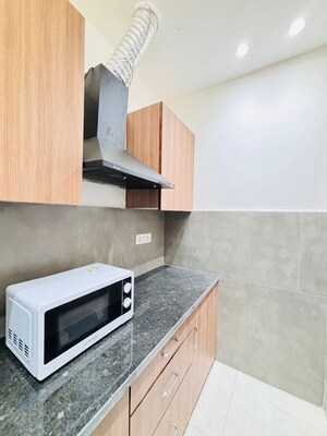 Kitchen in 1 BHK Builder Floor at Sushant Lok I – for Rent