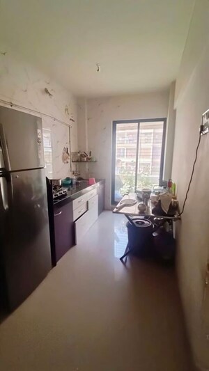 Kitchen in 2 BHK Apartment at Sidheshwar Complex Building 1 A Wing, Titwala – for Sale