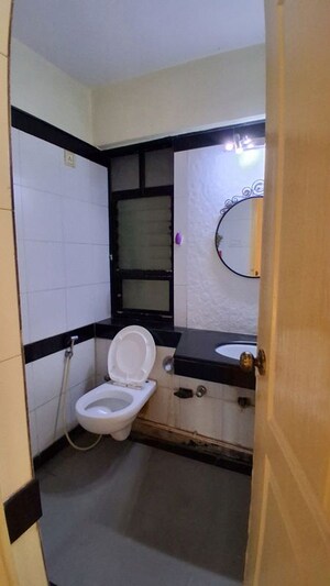 Bathroom in 2 BHK Apartment at Shikhar Kunj Malad, Malad East – for Rent