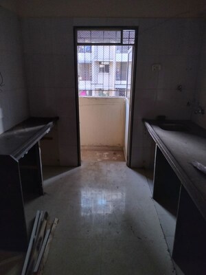 Kitchen in 2 BHK Apartment at Laxmi Kailash Garden , Kalyan West – for Rent