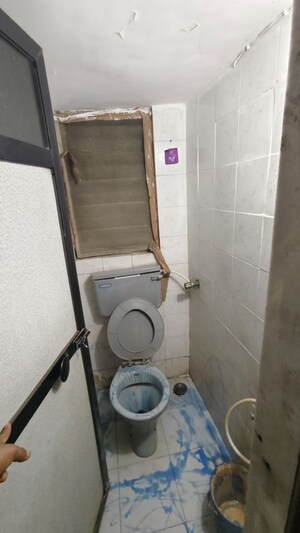 Bathroom in 1 BHK Apartment at Gokul Garden CHS, Kandivali East – for Rent