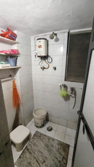 Bathroom in 1 BHK Apartment at Gokul Garden CHS, Kandivali East – for Rent