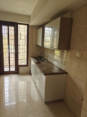 Kitchen in 4 BHK Builder Floor at Defence Colony – for Rent
