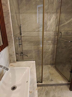 Bathroom in 4 BHK Builder Floor at Defence Colony – for Rent