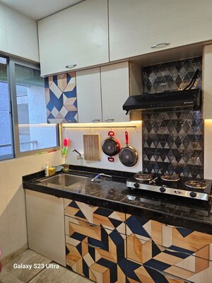 Kitchen in 3.5 BHK Apartment at Silver Sand CHS, Andheri West – for Rent